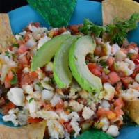 Ceviche · Halibut marinated in fresh lime juice and flavorful spices. Mixed with our home made pico de...