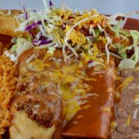El Hombre · A chile relleno stuffed with cheese and smothered in beef, a chicken flauta, and beef enchil...