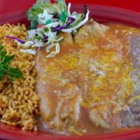 Chiles Rellenos Dnr · 2 mild peppers stuff with jack cheese, dipped with egg batter, fried to a golden brown. Topp...