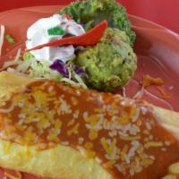 Chimichanga · Deep-fried burrito filled with beans. Your choice of chicken, or  beef . Smothered in sauce ...
