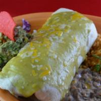 Burrito De Carne Asada · A soft burrito filled with rice, grilled steak with cheese. Covered in green sauce, and topp...