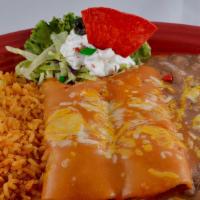Enchiladas Dnr · Your choice of cheese, chicken or beef. Topped with sauce and garnished with sour cream. Our...