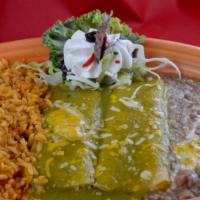 Enchiladas Verdes · Your choice of cheese, chicken or beef covered in tomatillo sauce and melted cheese. Garnish...