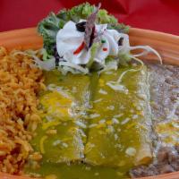 Spinach Enchiladas Dnr · 2 corn tortillas filled with spinach, tomato, and onions. Garnished with green sauce and sou...