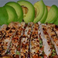 Ave Y Avocado Tostada · Charbroiled chicken breast. Filled with avocado, lettuce, black beans, rice, pico de gallo, ...