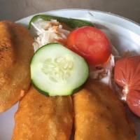 Pastelitos De Carne · Meat turnovers. Made with ground beef and some vegetables like potatoes and pieces of carrots