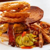 Paramount Burger · applewood smoked bacon, cheddar cheese, crispy onion rings and brioche roll. Served with Fre...