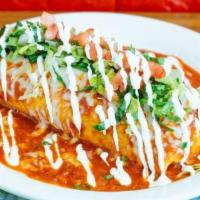 Burrito (Dinner) · All burritos are wrapped in a soft flour tortilla with Mexican rice, beans, and your choice ...