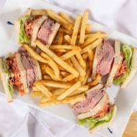 Roast Beef Club · Bacon, lettuce, and tomatoes. Served with French fries, mayonnaise, lettuce, tomato, colesla...