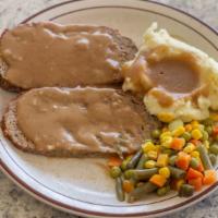 Homemade Baked Meatloaf · Served with two vegetables, soup or salad, roll, and butter.