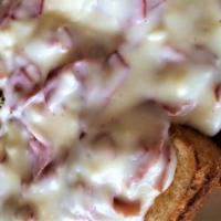 Cream Chipped Beef · On toast with home fries. Includes home fries, toast, and butter and jelly.