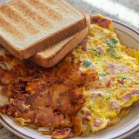 Western Omelette · served with green peppers, onions, and ham. Includes home fries, toast, and butter and jelly.