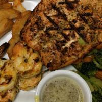 Fisherman'S Plate · Atlantic salmon (8 oz.) and grilled shrimp brochette, lemon sauce with capers and shallots.