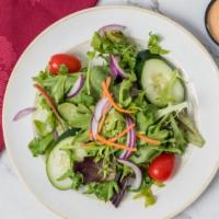 Large Good Success Garden Salad · Fresh spring salad mix with cucumbers and tomatoes.
