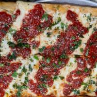 Sicilian Grandma Pizza · Crushed tomatoes with fresh garlic, spices, and fresh mozzarella.