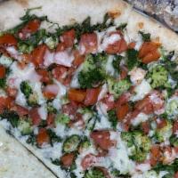 Veggie Lovers Pizza · Broccoli, spinach, tomato, onions, green peppers, and mushrooms.