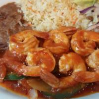 Camarones Entomatados · Shrimp sauteed with tomatoes and onions in a white wine sauce