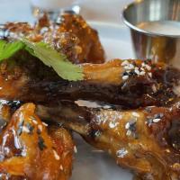 Duck Wings · Sweet chili, sesame, and cilantro.