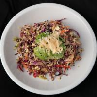 Thai Avocado Salad · Cabbage and Carrots, Avocado, Crispy Rice Noodles, Ginger-Soy Dressing