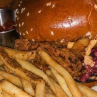 Fried Chicken Sandwich · Fried buttermilk chicken, pickled jalapenos, red cabbage slaw, and spicy mayo on seeded brio...