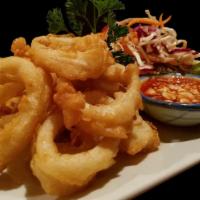 Golden Ring · Fresh calimari fried with Thai beer batter until golden brown and crispy served with sweet t...