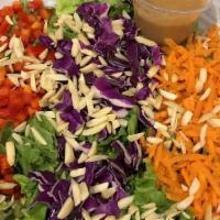 Thai Peanut Crunch Salad · Green Leaf Lettuce, Purple Cabbage, Shredded Carrot, Red Pepper, Almonds, Chia Seed. Thai Pe...