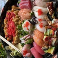 Sashimi For Two · Fourty five pieces of assorted raw fish.
Consuming raw or undercooked seafood and shellfish,...