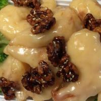 Snow White Shrimp With Walnut · Comes with lightly breaded jumbo shrimp with mayo, creamy sauce and served with honey roaste...
