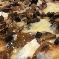 Wild Mushroom Pizza (V) · fontina, ricotta, caramelized onion, truffle oil. Allergens: gluten, dairy