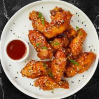 Spectral Sweet & Sour Wings · Fresh chicken wings , fried until golden brown, and tossed in sweet and sour sauce. Served w...