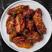 Terrific Teriyaki Wings · Fresh chicken wings , fried until golden brown, and tossed in teriyaki sauce. Served with a ...
