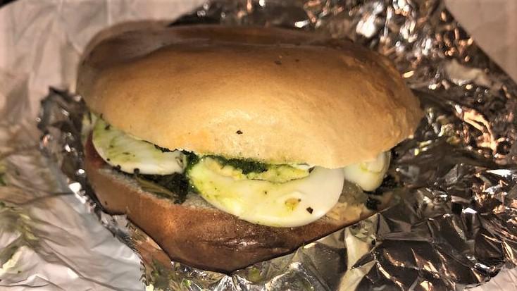 The Green Egg Sandwich · Kale, hard-boiled egg, herb hummus, portobello, herbed cream cheese, caramelized onions and red pepper, za'atar, and fried shallots. Add hard boiled or fried egg to any order and make it a salad, wrap, or on a focaccia bread for an additional charge.