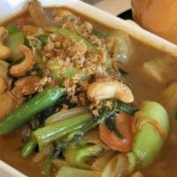 Masaman Curry · Hot & spicy. Coconut milk, potato, onion & cashew nut.