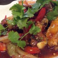Pla Rad Pik (Fried) · Hot & spicy. Topped with bell pepper, onion, red onion, tomato, scallion & chili sauce.