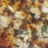 North End · This pizza has become a home plate favorite! Topped with Italian sausage, ricotta cheese, fr...