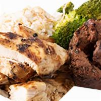 Mixed Grill Dinner · The best of both! Filet mignon steak tips and fresh grilled chicken breast served over homem...
