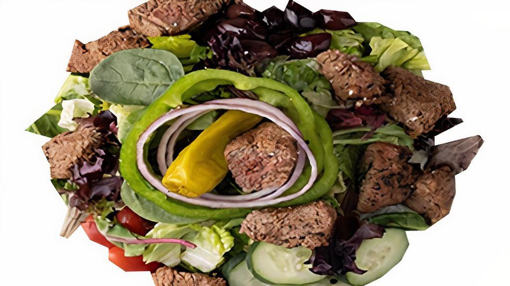 Filet Mignon Steak Tip Salad · Tender, juicy steak tips, perfectly marinated and grilled to order. Served over a fresh garden salad, tossed Caesar salad or our delicious Greek salad.
