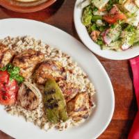 Chicken Kabob · Tender chunks of chicken breast marinated with special spices and charbroiled. served with r...