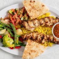 Grilled Chicken · grilled chicken and vegetables served over rice.
