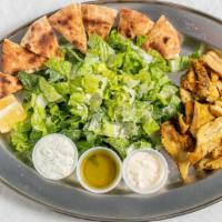 Chicken Shawarma Salad · Marinated chicken over fresh lettuce, tomatoes, onions, cucumbers, olives, vinegar, olive oi...