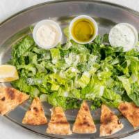 Egyptian Salad · Lettuce, tomatoes, cucumbers, onions, olive oil, vinegar, fresh lemon, tahini sauce and home...