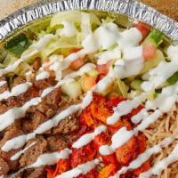 Combo Over Rice · Want the best of both worlds? Enjoy a cart style chicken and lamb over rice with salad and c...