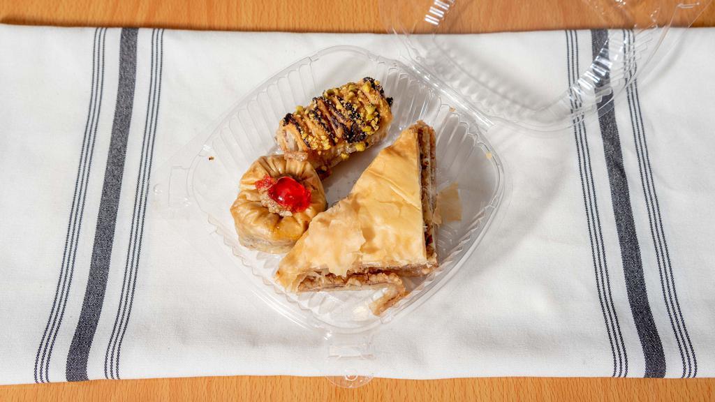Baklava · Layered pastry dessert made of filo pastry, filled with chopped nuts, and sweetened with honey.