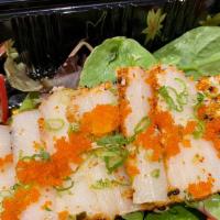 White Tuna Tataki · Lightly seared with microgreens and ponzu sauce.