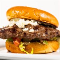 Hercules Burger · Seasoned beef burger with tzatziki, feta cheese, lettuce, and tomato on a brioche bun.