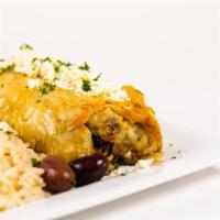 Spanakopita Platter · Spinach and feta wrapped in crispy  phyllo dough and baked to perfection.