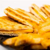 Grilled Cheese Pita · Served with fries.