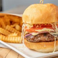 House Burger · American cheese || shaved lettuce || tomato || onion || house-baked bun