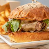 Beef On Weck · prime rib on our house-baked Kimmelweck  bun || cheddar || horseradish sauce || arugula || a...