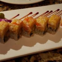 Snow Mountain Maki · Shrimp tempura and cucumber. Topped with real crabmeat, mayo and scallion.